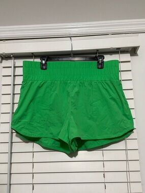JoyLab Bright Green High-Rise Athletic Shorts and Orange pair